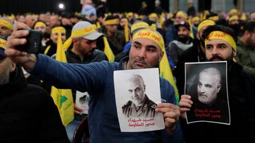 Hezbollah supporters holding posters of slain Iranian general Qasem Soleimani Beirut's southern suburbs on January 5, 2020. (File Photo: Reuters)