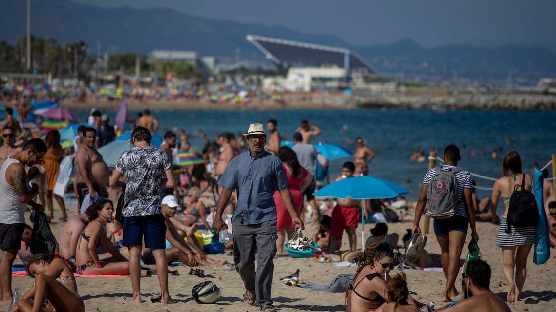 People enjoy the beach in Barcelona on July 18, 2020. (AP)
