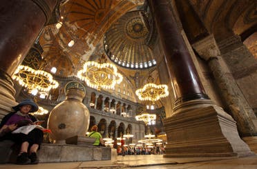 A foreign tourist pauses as she visits the Byzantine monument of Hagia Sophia on May 25, 2011. (AFP)