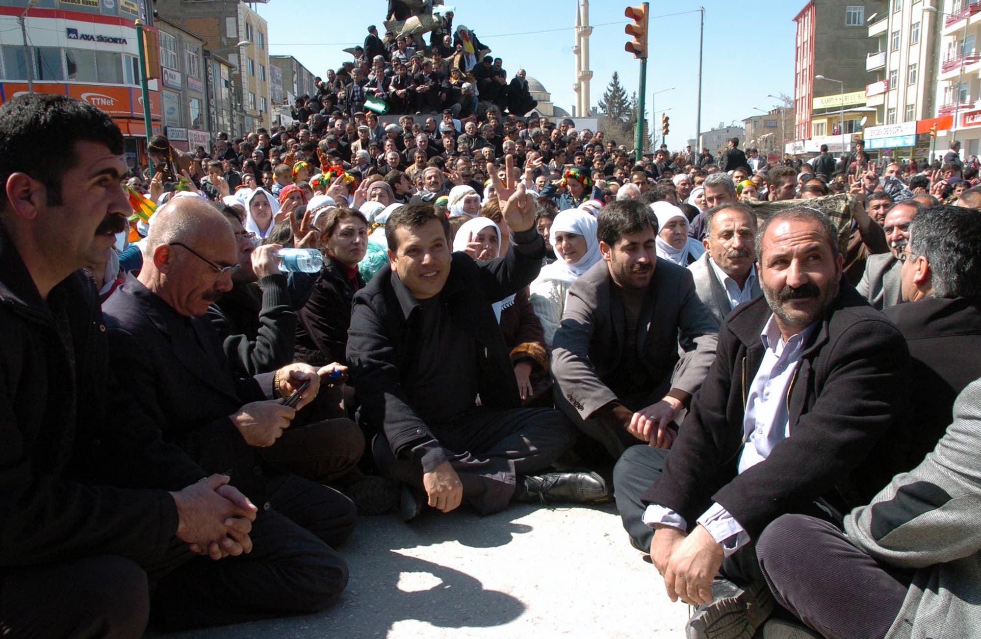 Kurdish activists and politicians occupy a main road as the part of their civil disobedience campaign in Van, Turkey on March 26, 2011. (AP)