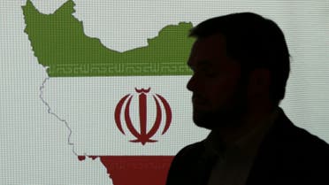 Director at one of FireEye's subsidiaries, stands in front of a map of Iran as he speaks to journalists about the techniques of Iranian hacking, on Sept. 20, 2017, in Dubai.  (File photo: AP)