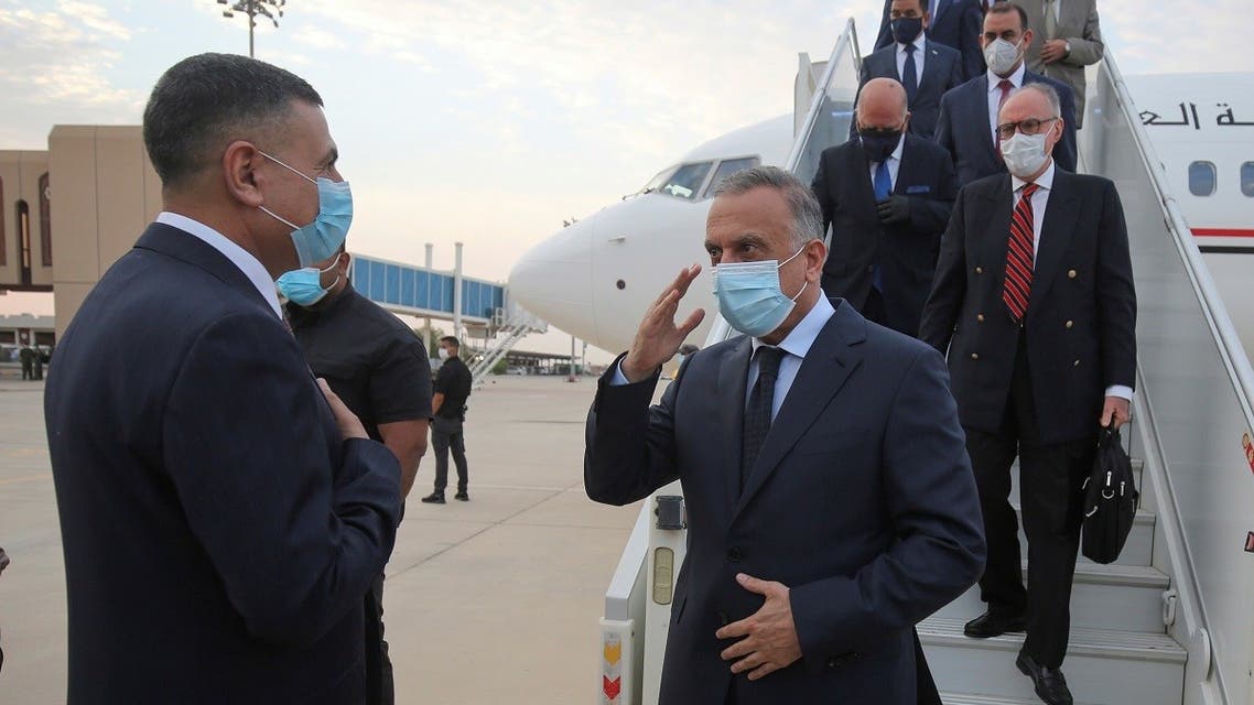 Iraqi Prime Minister Mustafa Al-Kadhimi is welcomed by Asaad Al-Eidani, Governor of Basra, at the Basra airport, Iraq, July 15, 2020. (Reuters)