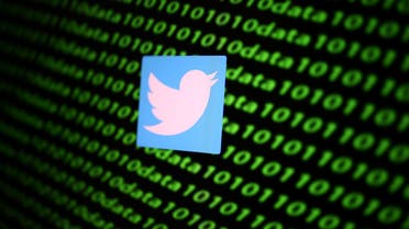 The Twitter logo and binary cyber codes are seen in this illustration taken November 26, 2019. (Reuters)