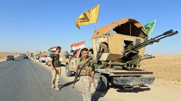 Shia Popular Mobilization Unit (PMU) militants are seen in Zumar, Nineveh province, Iraq October 18, 2017. (Reuters)