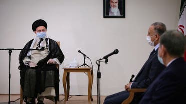 Iran's Supreme Leader Ayatollah Ali Khamenei meets with Iraqi Prime Minister Mustafa al-Kadhimi as they wear protective masks, in Tehran. (Reuters)