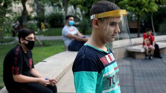 Coronavirus: Top US health officials recommend face shields, masks