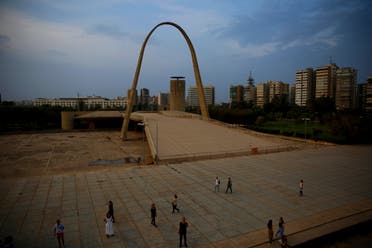 In this Saturday, Oct. 20, 2018 photo, visitors tour The Open Air Theater, designed in the early 1960s by the late Brazilian architect Oscar Niemeyer, at the Rashid Karami International Fair, in the northern city of Tripoli, Lebanon. The fairground has just been included on the list of sites eligible for listing on the World Heritage of Humanity by UNESCO. (AP)