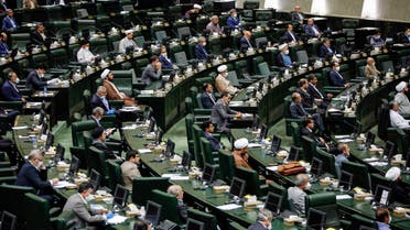 Iranian lawmakers attend a session at the Iranian parliament in Tehran on May 28, 2020. Iran's newly formed parliament elected the former Tehran mayor Mohamad Bagher Ghalibaf as its speaker, consolidating the power of conservatives ahead of next year's presidential election. State television said the 58-year-old received 230 votes out of the 267 cast to secure the post, one of the most influential positions in the Islamic republic.