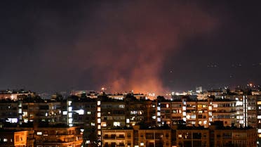 Smoke billows following an Israeli airstrike targeting south of the capital Damascus, on July 20, 2020. (AFP)
