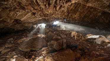 Researchers entering at a cave in Zacatecas in central Mexico, which contained stone tools and other evidence of the presence of prehistoric human populations, are seen in this image released on July 22, 2020. (Reuters)