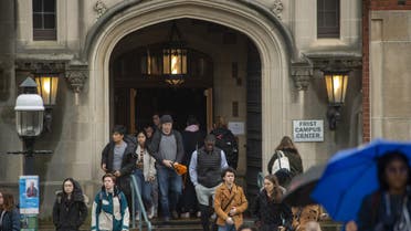 Students exit a building between classes at Princeton University on February 4, 2020 in Princeton, New Jersey. (AFP)