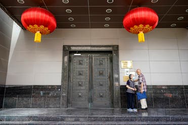 Visitors try to enter the Chinese Consulate General Wednesday, July 22, 2020, in Houston. (AP)