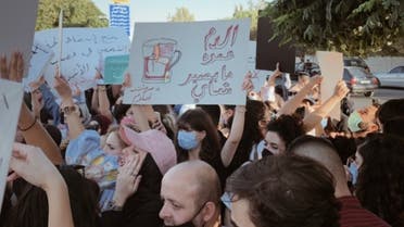 Jordanian women and men protest for better protection from gender-based violence after a woman was murdered by her father. (Twitter)
