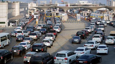 Cars line up at a checkpoint at King Fahd Causeway, a bridge connecting Saudi Arabia and Bahrain, at Bahrain-Saudi border, August 22, 2019. (Reuters)