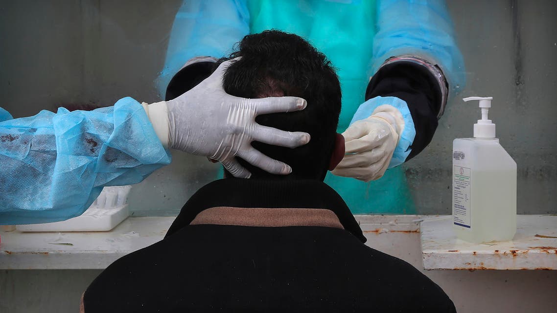 A person gets his nasal swab sample taken for COVID-19 test in Hyderabad, India on July 23, 2020. (AP)