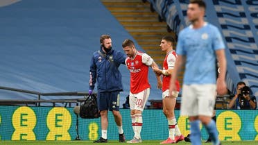 Arsenal’s Shkodran Mustafi walks off to be substituted after sustaining an injury, during the FA Cup Semi Final against Manchester City at Wembley Stadium, London, Britain, on July 18, 2020. (Reuters) 
