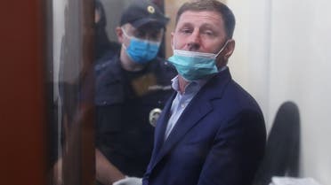 Governor of Khabarovsk Region Sergei Furgal, accused of crimes including attempted murder, stands inside a defendants' cage during a court hearing in Moscow, Russia, on July 10, 2020. (Reuters)