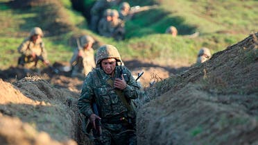 Armenian soldiers take their position on the front line in Tavush region, Armenia, July 14, 2020. (AP)