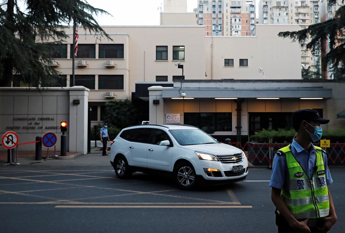 A car leaves the US Consulate General in Chengdu, Sichuan province, China, on July 26, 2020. (Reuters)