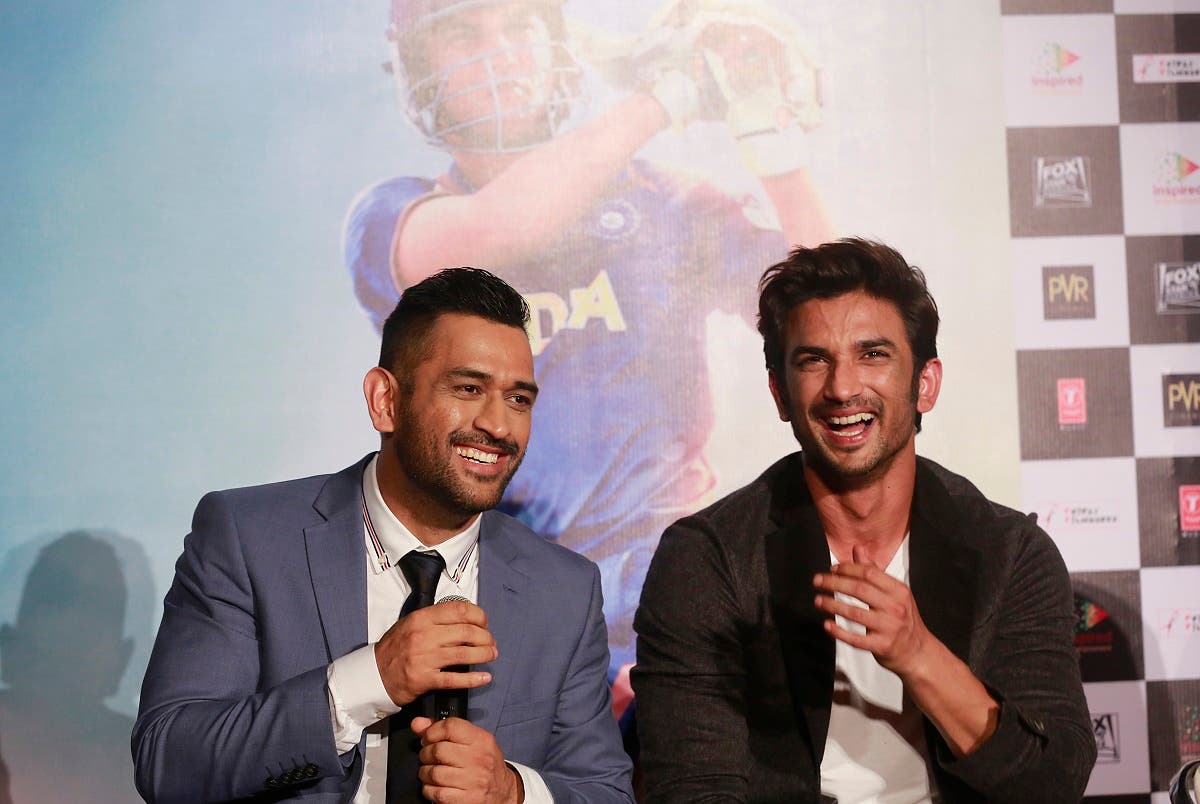 Indian cricketer Mahendra Singh Dhoni, left, shares a light moment with Bollywood actor Sushant Singh Rajput as they speak with the media during the trailer launch of upcoming movie 'MS Dhoni: The Untold Story' in Mumbai, India, Thursday, Aug 11, 2016. (AP)