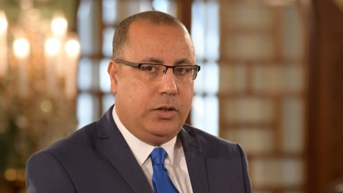 Tunisian Interior Minister Hichem Mechichi takes the oath of office at the Carthage Palace outside the capital Tunis, on February 27, 2020. (AFP)