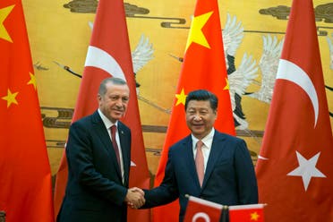 Chinese President Xi Jinping, right shakes hands with Turkey's President Recep Tayyip Erdogan, as they attend a signing ceremony in Beijing, on July 29, 2015. (File photo: AP)