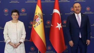 Turkish Foreign Minister Mevlut Cavusoglu and his Spanish counterpart Arancha Gonzalez Laya pose before their meeting in Ankara, Turkey, July 27, 2020. (Reuters)