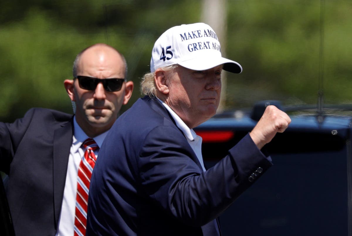 US President Donald Trump gestures during a roadside stop in New Jersey, US, July 26, 2020. (Reuters)