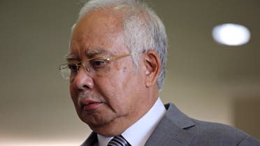 Former Malaysian Prime Minister Najib Razak reacts during a break at Kuala Lumpur High Court in Kuala Lumpur, Malaysia, February 5, 2020. (Reuters)