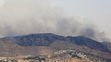 Smoke rises from the disputed Shebaa Farms area as seen from Ibl al-Saqi village in southern Lebanon July 27, 2020. REUTERS/Aziz Taher