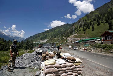 India’s Border Security Force (BSF) soldiers stand guard at a checkpoint along a highway leading to Ladakh, at Gagangeer in Kashmir's Ganderbal district on June 17, 2020. (File photo: Reuters)