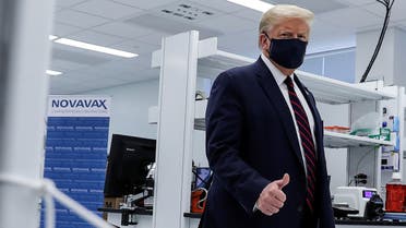 U.S. President Donald Trump gestures during a tour of the Fujifilm Diosynth Biotechnologies' Innovation Center, a pharmaceutical manufacturing plant where components for a potential coronavirus disease (COVID-19) vaccine candidate Novavax are being developed, in Morrrisville, North Carolina, U.S., July 27, 2020. REUTERS/Carlos Barria