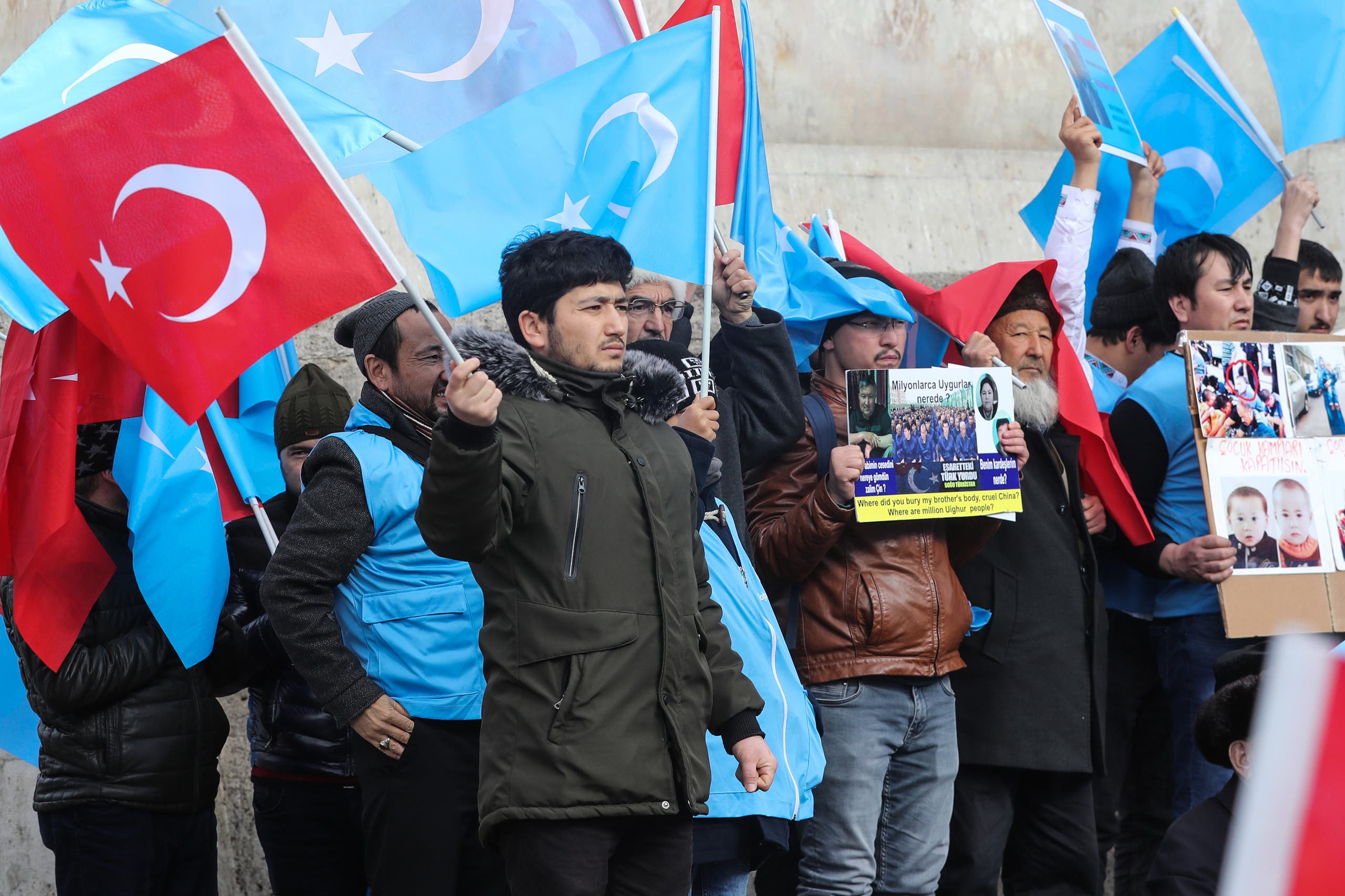 Uighurs living in Turkey stage a demonstration in Ankara on February 5, 2020. (AFP)