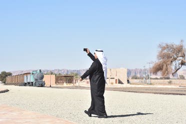 A picture taken on January 4, 2019, shows a people visiting the Hejaz train station near Saudi Arabia's northwestern town of al-Ula, an Ottoman era railway. (AFP)