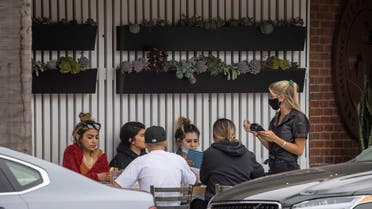 To help keep restaurants open during the outbreak of the coronavirus disease (COVID-19), dining space has been made available along the side walk in Encinitas, California, U.S., July 30, 2020. (Reuters)