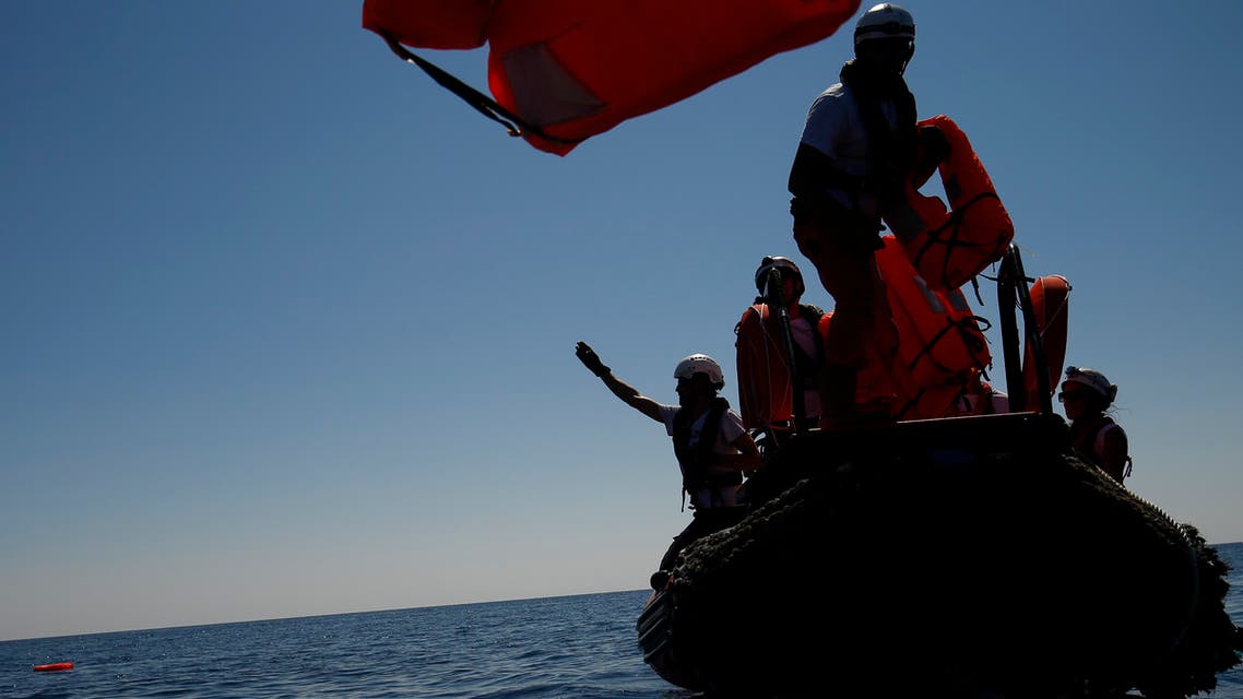 Members of SOS Mediterranee NGO and Doctors Without Borders (MSF) perform a rescue drill near the Aquarius rescue vessel, chartered by French NGO SOS-Mediterranee and Doctors Without Borders (MSF), at open sea between Lampedusa and Tunisia, on June 23, 2018. 