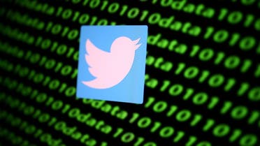 The Twitter logo and binary cyber codes are seen in this illustration. (File Photo: Reuters)