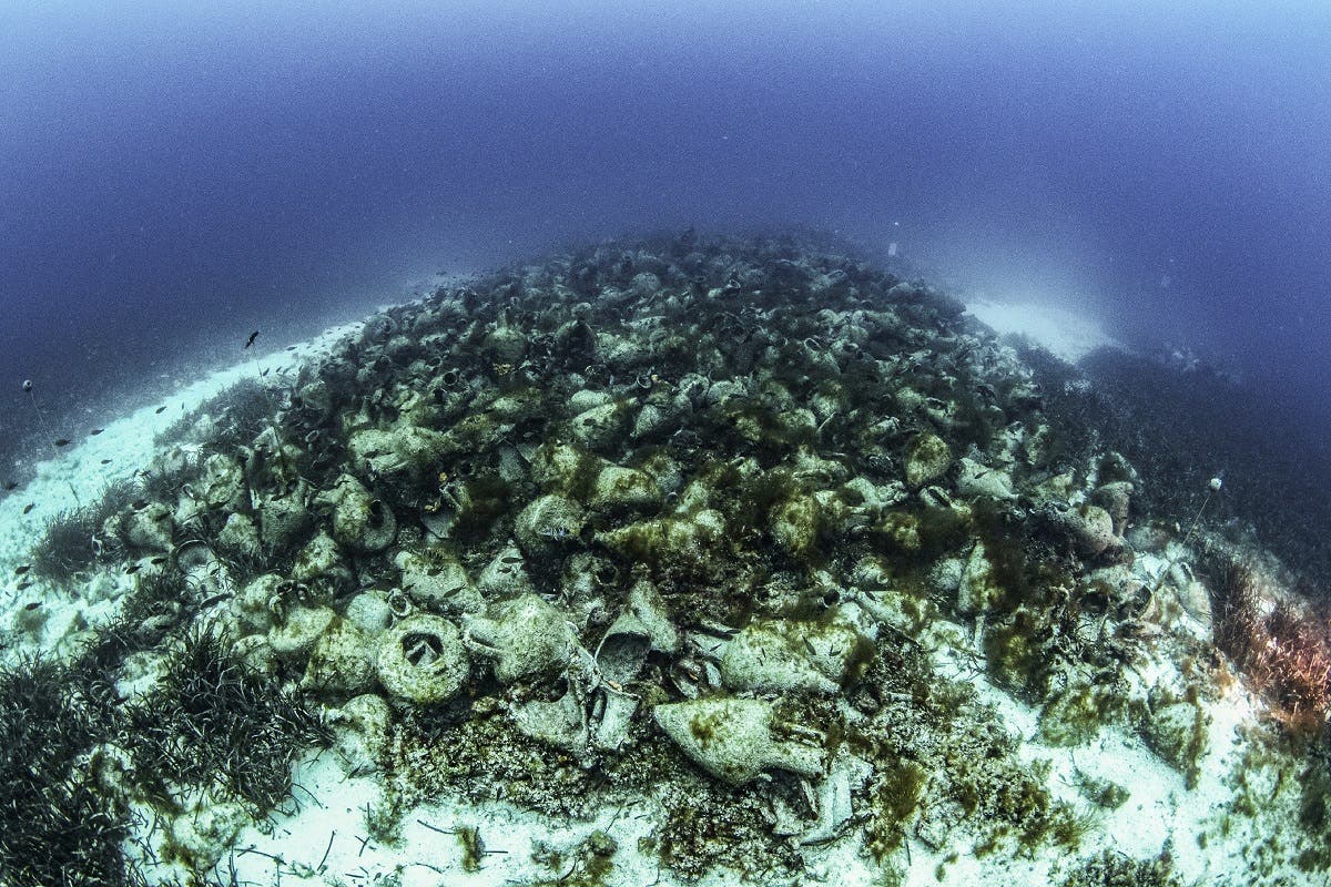 This undated handout photo taken and released by the Ephorate of Underwater Antiquities on April 9, 2019 shows an underwater view of the ruins of an ancient shipwreck on the Aegean island of Alonissos, Greece. (AFP)