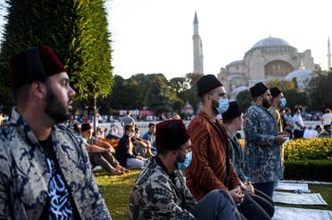 Worshippers take part in the Eid al-Adha prayers outside Hagia Sophia in Istanbul on July 31, 2020. (AFP)