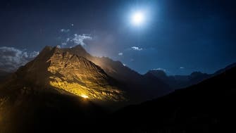 Swiss mountains light up in a national day celebration to suit COVID-19 era