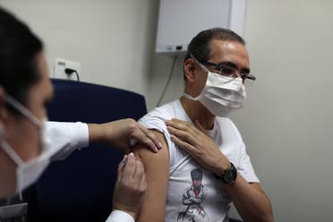 A nurse administers China's SinoVac coronavirus potential vaccine to volunteer and doctor Ivan Franca at Emilio Ribas Institute in Sao Paulo, Brazil. (Reuters)