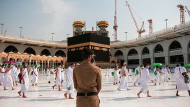 A handout picture provided by Saudi Ministry of Media on July 31, 2020 shows pilgrims circumambulating around the Kaaba, the holiest shrine in the Grand mosque in the holy Saudi city of Mecca. (AFP)