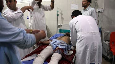 A wounded man receives treatment at a hospital after a suicide car bomb and multiple gunmen attack in the city of Jalalabad, east of Kabul, Afghanistan, Sunday, August 2, 2020. (AP)