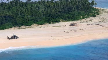 In this photo provided by the Australian Defence Force, an Australian Army helicopter lands on Pikelot Island in the Federated States of Micronesia, where three men were found, Sunday, Aug. 2, 2020, safe and healthy after missing for three days. (AP)