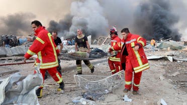 A man is evacuated at the site of an explosion in Beirut, Lebanon August 4, 2020. (Reuters)