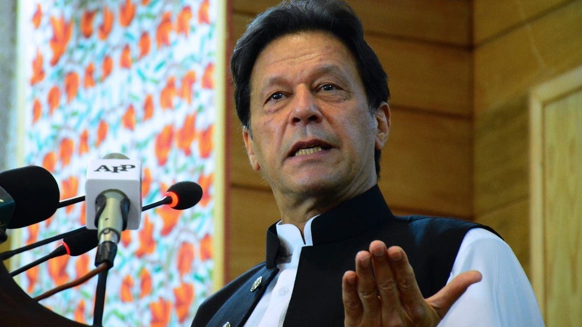 Pakistan’s Prime Minister Imran Khan addresses the legislative assembly in Muzaffarabad, the capital of Pakistan-controlled Kashmir on August 5, 2020, to mark the one-year anniversary after New Delhi imposed direct rule on Indian-administered Kashmir. (AFP)