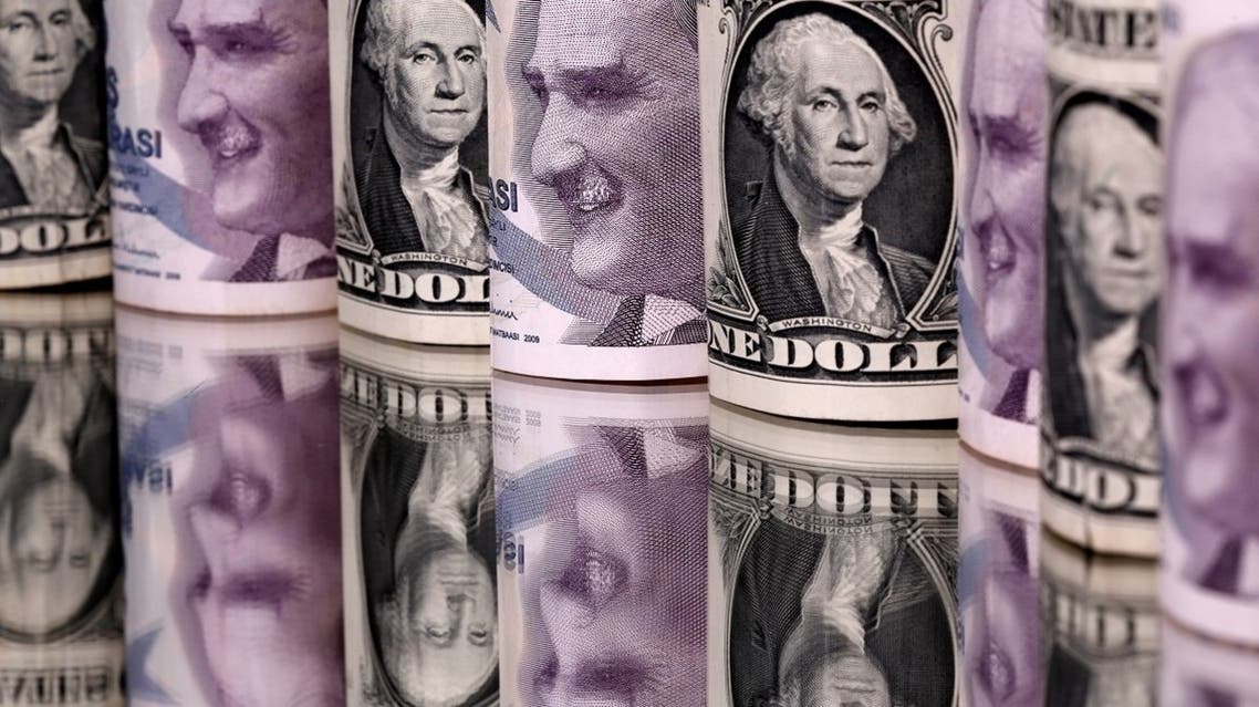 Turkish lira and U.S. dollar banknotes are seen in this illustration taken January 6, 2020. REUTERS