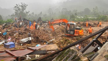 Rescue workers look for survivors at the site of a landslide during heavy rains in Idukki, Kerala, India, August 7, 2020. REUTERs