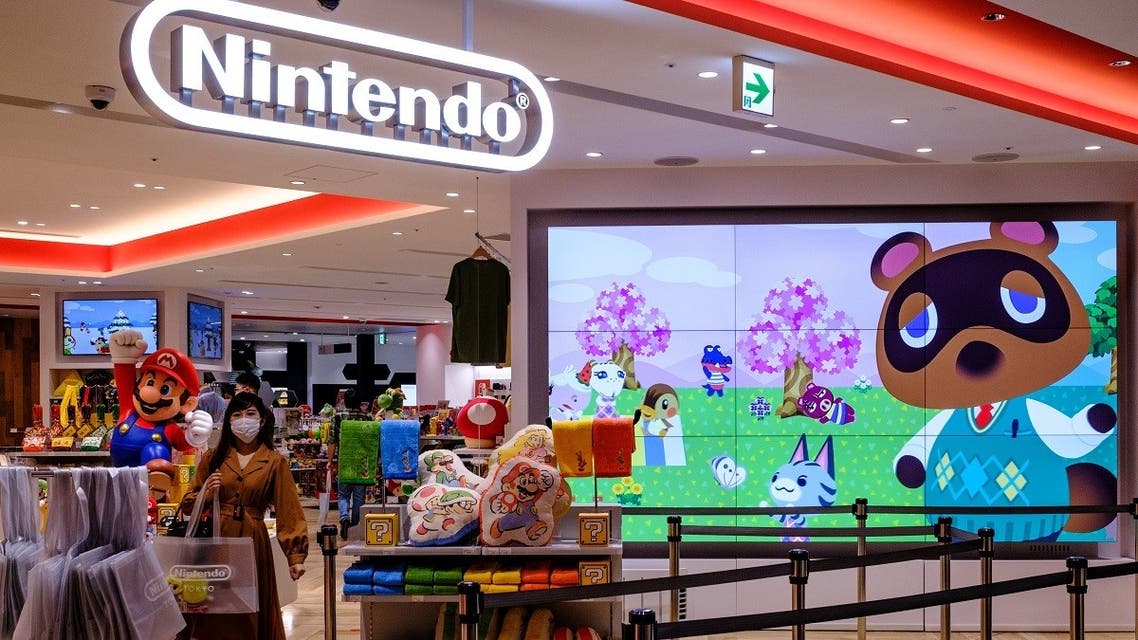 000_1WB5VWA screen displaying the characters from the Animal Crossing series video game at a Nintendo store in Tokyo. (AFP)