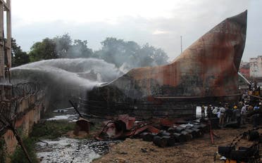 File photo of firefighters try to douse a fire from an oil tanker at a port in the southern Indian city of Chennai.  (Reuters)